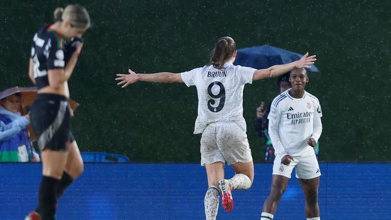 Real Madrid's Signe Bruun, centre, runs towards her team mate Caicedo who scored the opening goal during the Women's Champions League quarterfinal first leg soccer match between Real Madrid and Arsenal at the Alfredo di Stefano stadium in Madrid, Spain, Tuesday March 18, 2025. (AP Photo/Fran Berg)