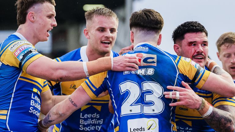 Leeds celebrate Riley Lumb's try against Wigan