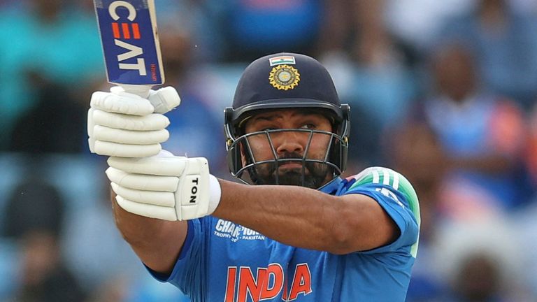 India's captain Rohit Sharma plays a shot during the ICC Champions Trophy final cricket match between India and New Zealand at Dubai International Cricket Stadium in Dubai, United Arab Emirates, Sunday, March 9, 2025. (AP Photo/Christopher Pike)