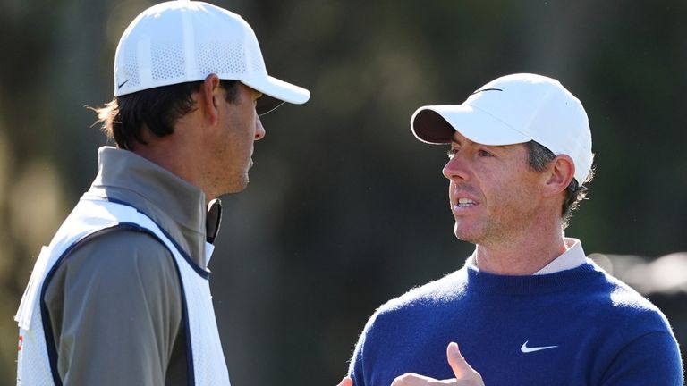 PONTE VEDRA BEACH, FL - MARCH 17: PGA golfer Rory McIlroy talks to caddy Harry Diamond during the aggregate playoff for The Players Championship at the Stadium Course at TPC Sawgrass on March 17, 2025, at Ponte Verde Beach, Florida. (Photo by Brian Spurlock/Icon Sportswire) (Icon Sportswire via AP Images)