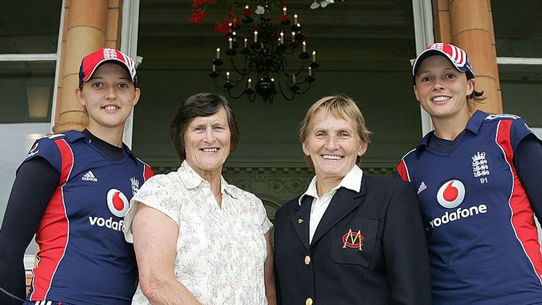 England's Sarah Taylor (L) and Caroline Atkins (R) with ex England batters Lynne Thomas and Enid Bakewell, after they broke their record in 2008