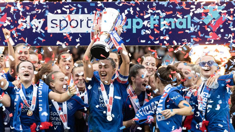 MOTHERWELL, SCOTLAND - MARCH 22: Rangers captain Nicola Docherty lifts the trophy during the Sky Sports Cup Final between Rangers and Hibernian at Fir Park, on March 22, 2025, in Motherwell, Scotland. (Photo by Ross Parker / SNS Group)