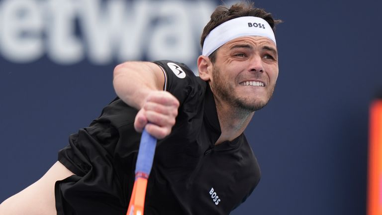 Taylor Fritz serves to Lorenzo Sonego at the Miami Open 