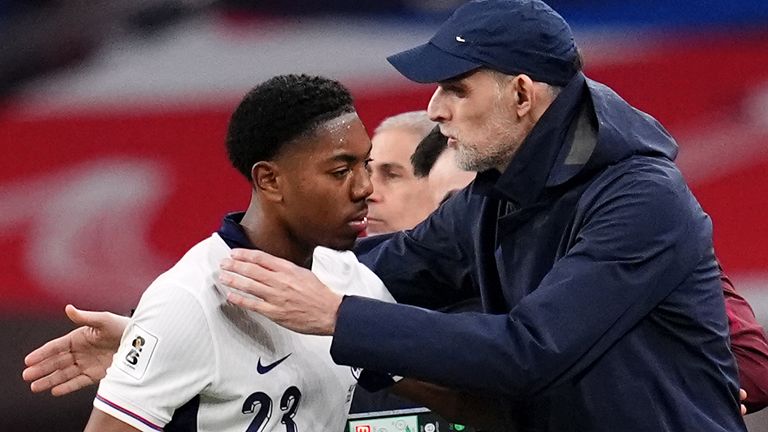 Myles Lewis-Skelly and Thomas Tuchel during England's win over Albania