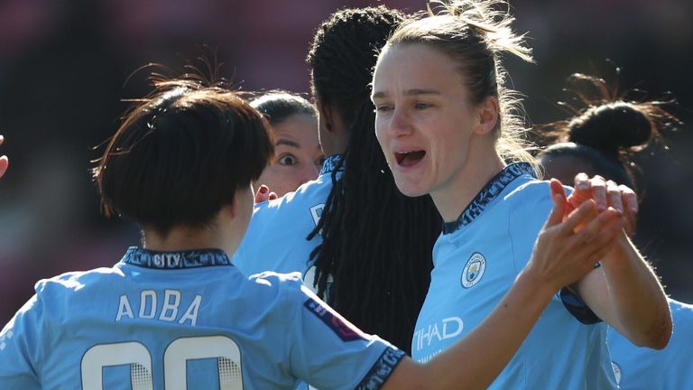 Vivianne Miedema celebrates with Aoba Fujino after scoring Manchester City's first goal at Tottenham