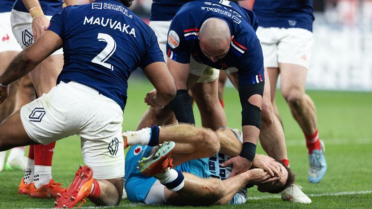 Ben White of Scotland shakes his face as he appeared to be stubborn by Peato Mauvaka of France of France