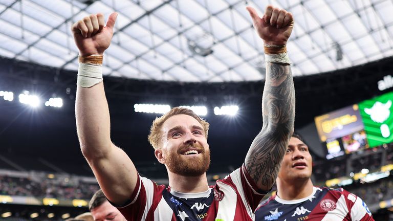 Picture by Alex Whitehead/SWpix.com - 01/03/2025 - Rugby League Las Vegas - Betfred Super League Round 3 - Wigan Warriors v Warrington Wolves - Allegiant Stadium, Las Vegas, USA - Adam Keighran of Wigan celebrates his teams victory over Warrington