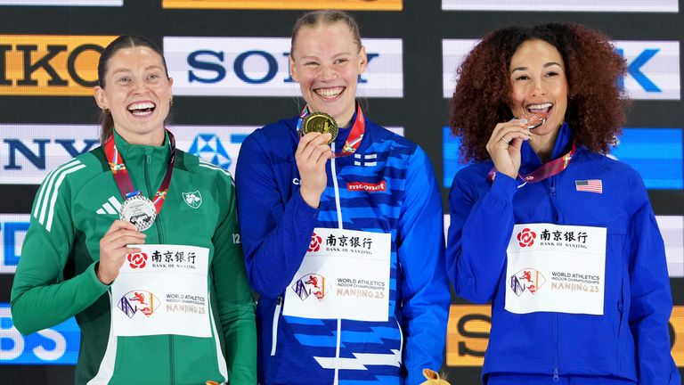 Silver medalist Kate O'Connor, of Ireland, gold medalist Saga Vanninen, of Finland, and Bronze medalist Taliyah Brooks, of the United States, pose with their medals on the podium of the pentathlon at the World Athletics Indoor Championships in Nanjing, China, Friday, March 21, 2025.(AP Photo/Vincent Thian)