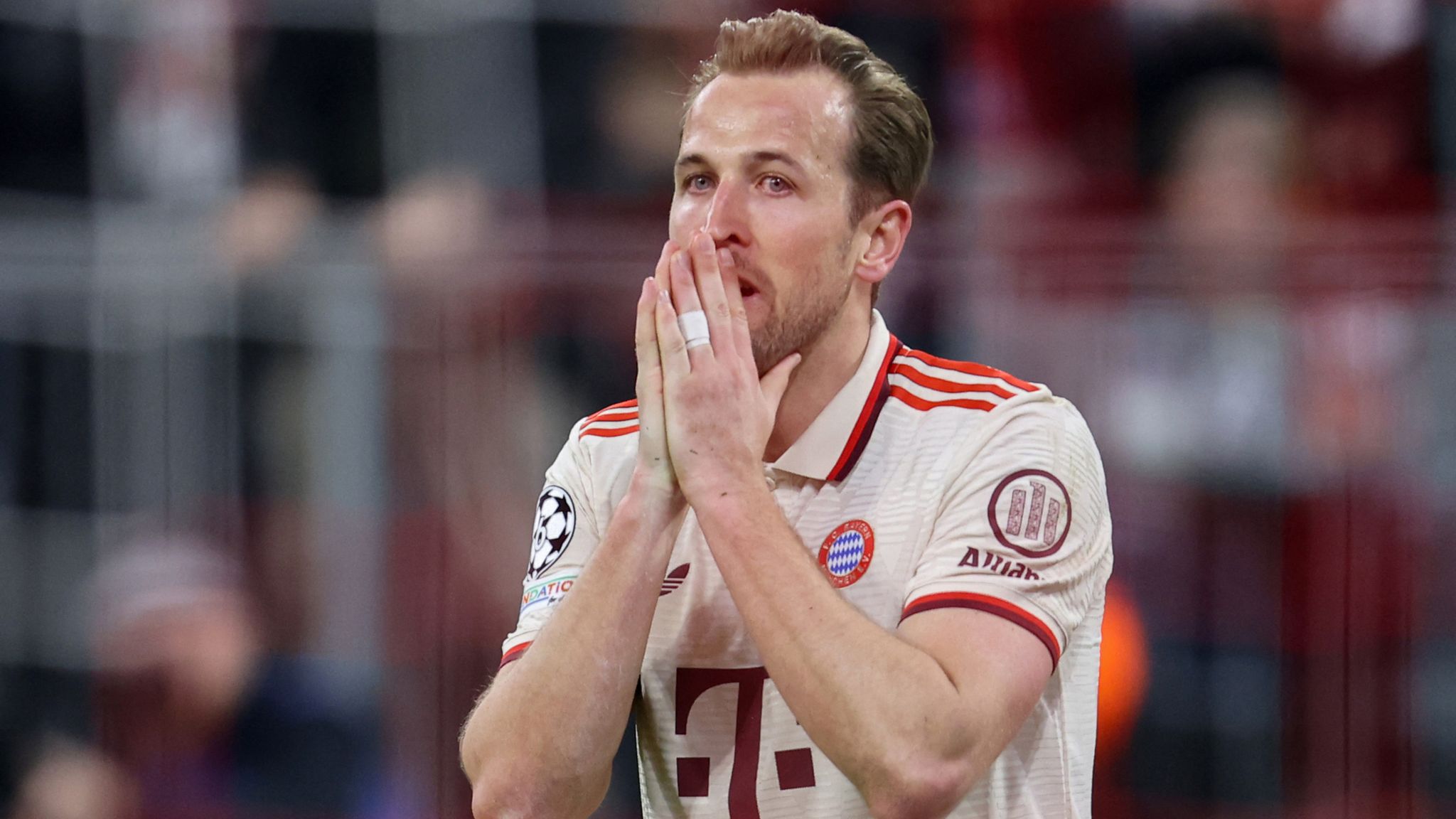 Kane celebrating with teammates