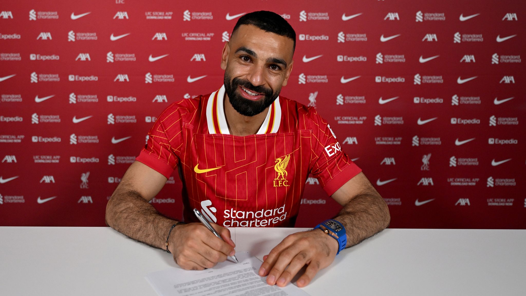 Mohamed Salah: Liverpool forward commits future to club by signing new deal to stay at Anfield | Football News | Sky Sports