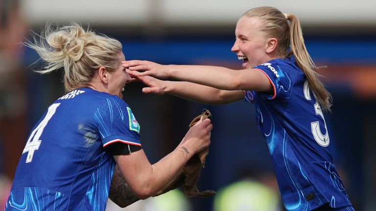Chelsea's Millie Bright and Aggie Beever-Jones celebrate after the Adobe Women's FA Cup semi-final match at Kingsmeadow,
