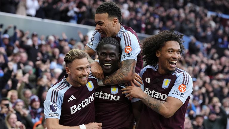 Aston Villa's Amadou Onana celebrates with his team-mates after making it 4-1 against Newcastle