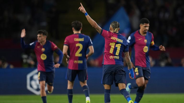 Barcelona's Raphinha, front, celebrates after scoring during the Champions League semifinal first leg soccer match between Barcelona and Inter Milan in Barcelona, Spain, Wednesday, April 30, 2025. AP Photo/Emilio Morenatti)