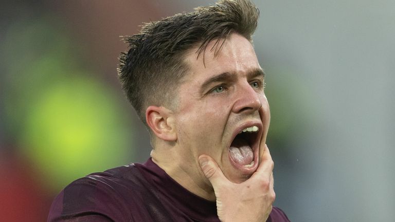 EDINBURGH, SCOTLAND - DECEMBER 26: Hearts' Cammy Devlin looks dejected at full time during a William Hill Premiership match between Heart of Midlothian and Hibernian at Tynecastle Park, on December 26, 2024, in Edinburgh, Scotland. (Photo by Mark Scates / SNS Group)