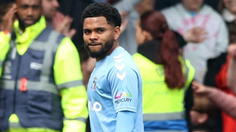 Jay Dasilva leaves the field after being shown a red card 
