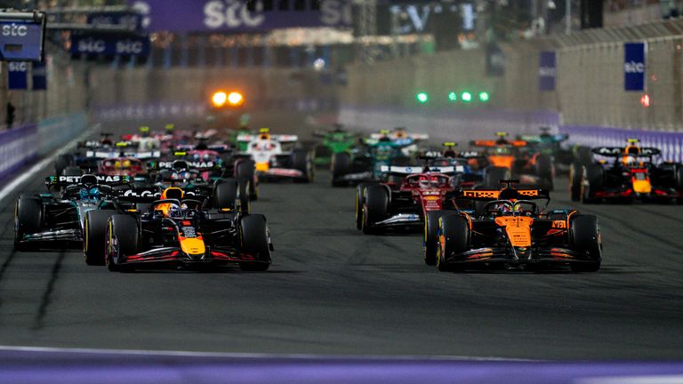 April 20, 2025, Jeddah, Saudi Arabia: Dutch driver MAX VERSTAPPEN (Red Bull Racing) and Australian driver OSCAR PIASTRI (McLaren F1 Team) battles for position at the start of the 2025 FIA Formula 1 Saudi Arabian Grand Prix at Jeddah Corniche Circuit in Jeddah, Saudi Arabia. (Cal Sport Media via AP Images)