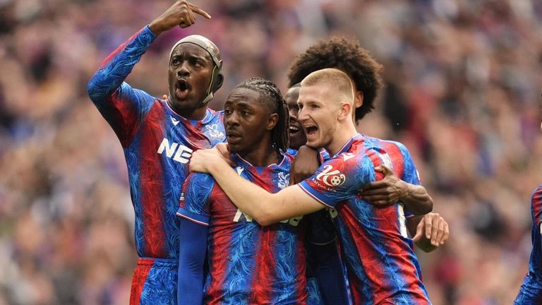 Eberechi Eze is mobbed by his team-mates after giving Crystal Palace the lead against Aston Villa at Wembley