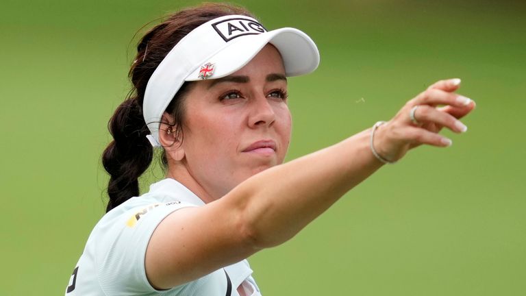 Georgia Hall, of England, tests the wind on the 16th hole during the first round of the Chevron Championship LPGA golf tournament Thursday, April 24, 2025, in The Woodlands, Texas. (AP Photo/Ashley Landis)