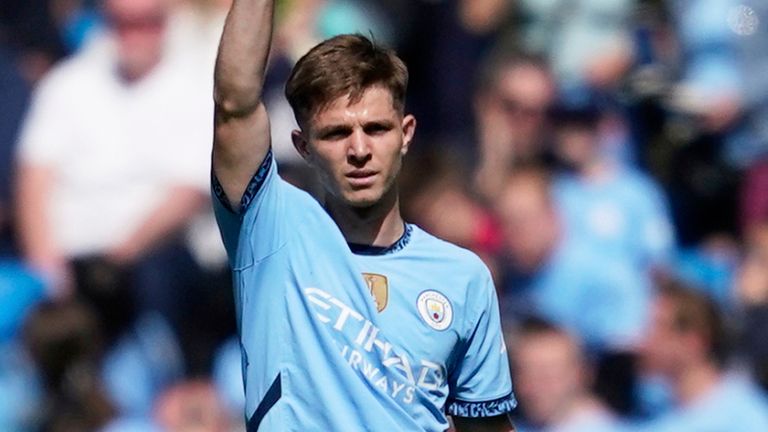 Manchester City's James McAtee celebrates scoring his side's fourth goal (AP Photo/Dave Thompson)