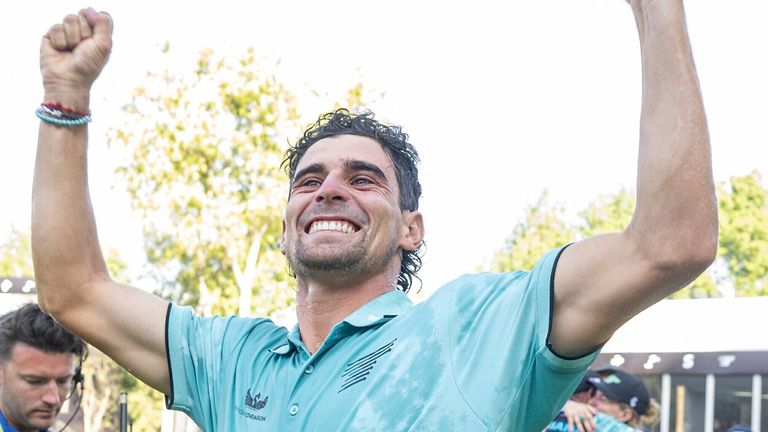 First-place individual champion captain Joaqu..n Niemann, center, of Torque GC, celebrates on the 18th green after the final round of LIV Golf Mexico City at Club de Golf Chapultepec, Sunday, April 27, 2025, in Naucalpan, Mexico. (Charles Laberge/LIV Golf via AP)