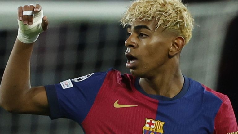 Barcelona's Lamine Yamal celebrates after scoring his side's opening goal during the Champions League semifinal first leg soccer match between Barcelona and Inter Milan at the Lluis Companys Olympic Stadium in Barcelona, Spain, Wednesday, April 30, 2025. (AP Photo/Joan Monfort)