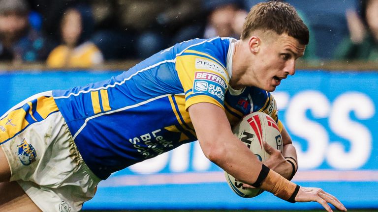 Picture by Alex Whitehead/SWpix.com - 18/04/2025 - Rugby League - Betfred Super League: Round 8 - Leeds Rhinos vs Huddersfield Giants - AMT Headingley Stadium, Leeds, England - Ash Handley of Leeds scores a try.