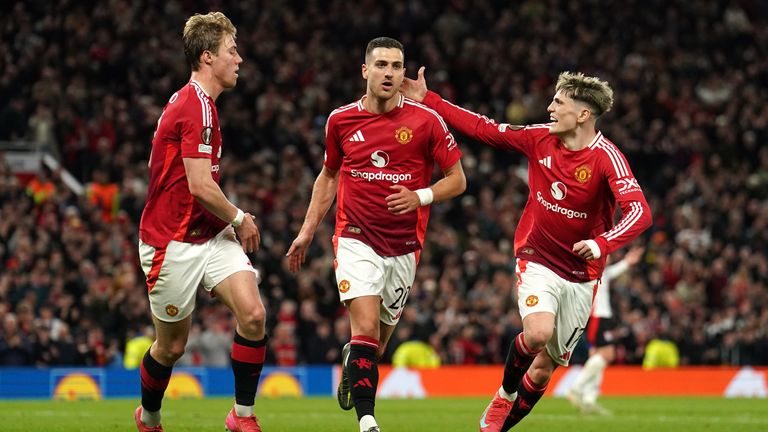 Manchester United's Diogo Dalot (centre) celebrates scoring their side's second goal of the game during the UEFA Europa League quarter-final, second leg match at the Old Trafford in Manchester, England. Picture date: Thursday April 17, 2025.