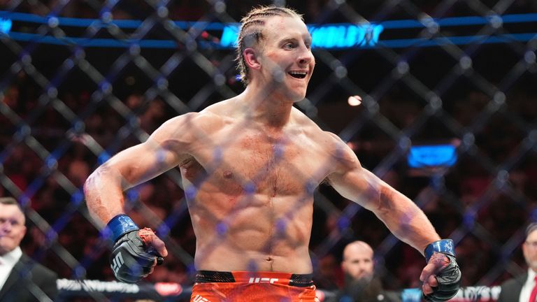 Paddy Pimblett reacts after defeating Michael Chandler during a mixed martial arts fight at UFC 314, Sunday, April 13, 2025, in Miami. (AP Photo/Lynne Sladky)