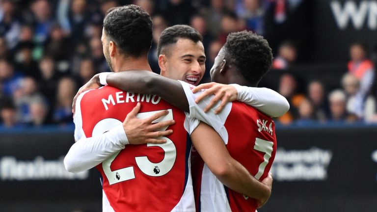 Gabriel Martinelli celebrates with his team-mates after doubling Arsenal's lead at Portman Road