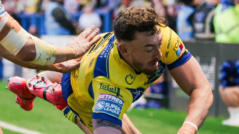 Picture by Alex Whitehead/SWpix.com - 24/04/2025 - Rugby League - Betfred Super League: Round 9 - Warrington Wolves vs St Helens - Halliwell Jones Stadium, Warrington, England - Matty Ashton of Warrington scores a try.