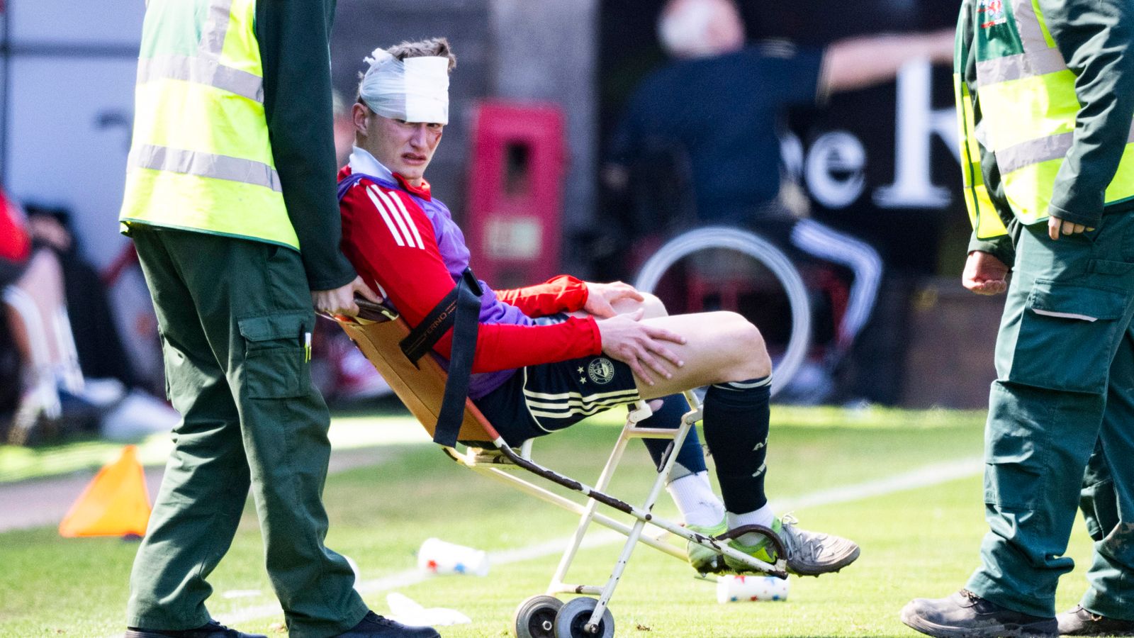 Aberdeen's Jack MacKenzie suffers head injury after being hit with an object thrown from crowd