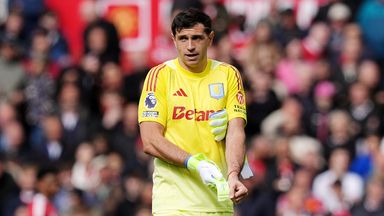 Aston Villa goalkeeper Emiliano Martinez leaves the pitch after being shown a red card