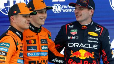 McLaren driver Oscar Piastri of Australia, centre, celebrates his pole position with McLaren driver Lando Norris of Britain