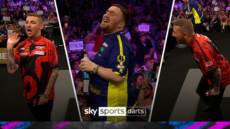 Nathan Aspinall and Luke Littler share a light-hearted moment on stage ahead of their semi-final clash on night 16 of the Premier League darts in Sheffield.