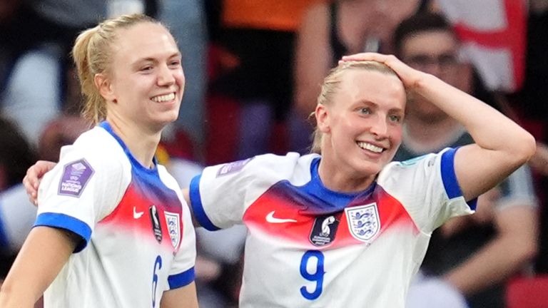 England's Aggie Beever-Jones (centre) celebrates with Esme Morgan (left) after scoring the third goal against Portugal