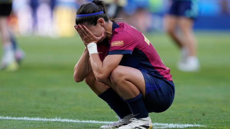 Barcelona's Aitana Bonmati reacts at the end of the women's Champions League final soccer match between Arsenal and FC Barcelona at the Jose Alvalade stadium in Lisbon, Saturday, May 24, 2025. (AP Photo/Armando Franca)