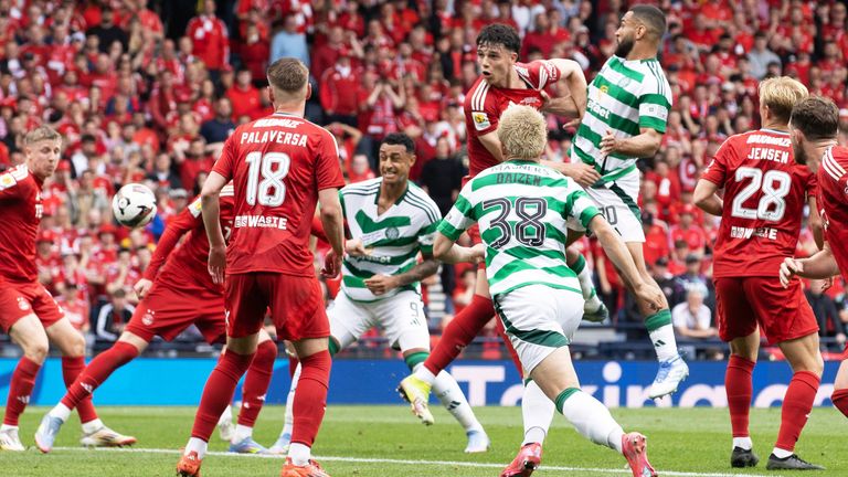 Celtic make it 1-0 as Cameron Carter-Vickers header comes off Aberdeen's Alfie Dorrington