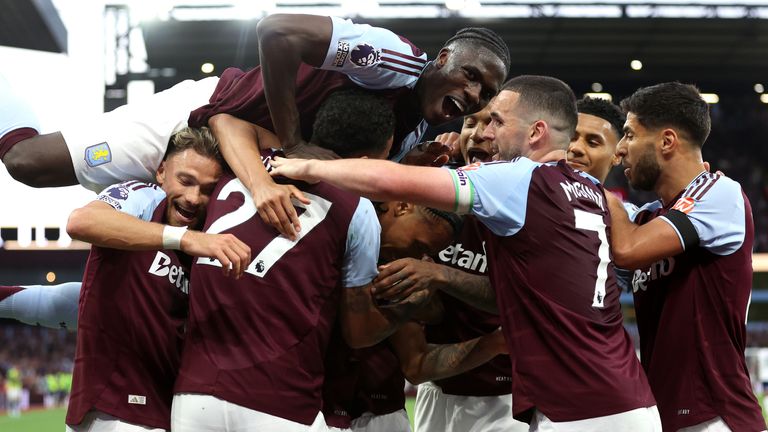 Boubacar Kamara is mobbed after scoring against Tottenham
