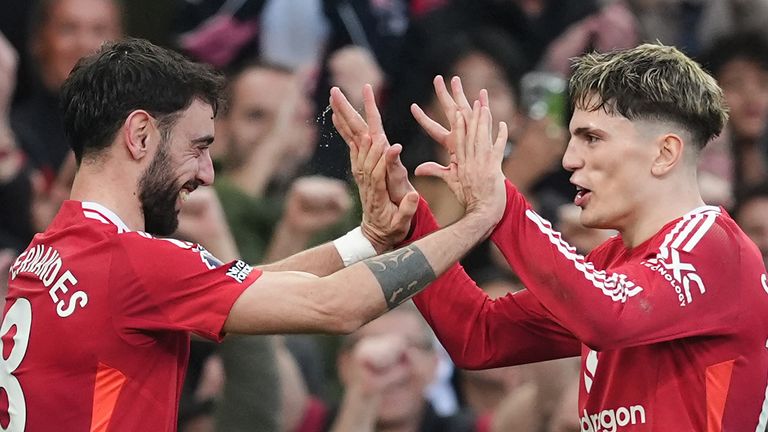 Manchester United's Bruno Fernandes (left) celebrates scoring their side's first goal of the game with team-mate Alejandro Garnacho during the Premier League match at Old Trafford, Manchester. Picture date: Sunday March 9, 2025.