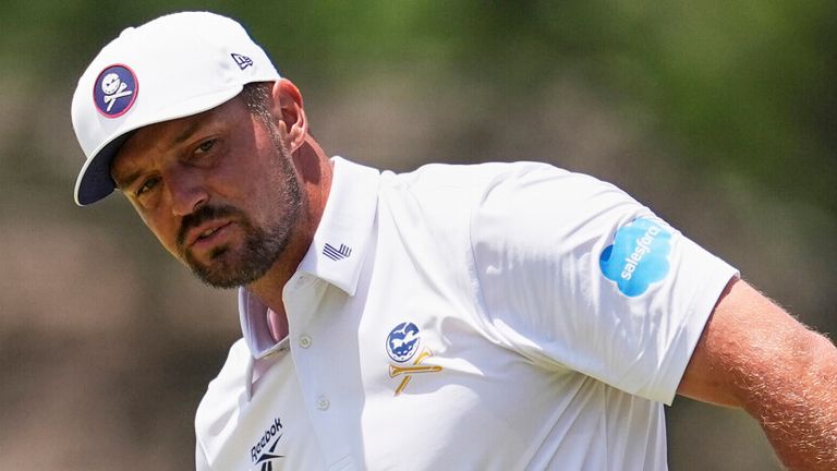 Praison Deschambo interacts after losing in the fourth hole during the third round of the PGA championship at Quail Hollow Club, Saturday, May 17, 2025, in Charlotte, AP Photo/George Walker IV)