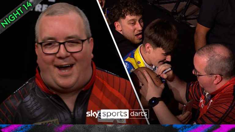 Stephen Bunting signed a fan's head during his walk-on for the semi-final on Night 14 of the Premier League in Leeds. 