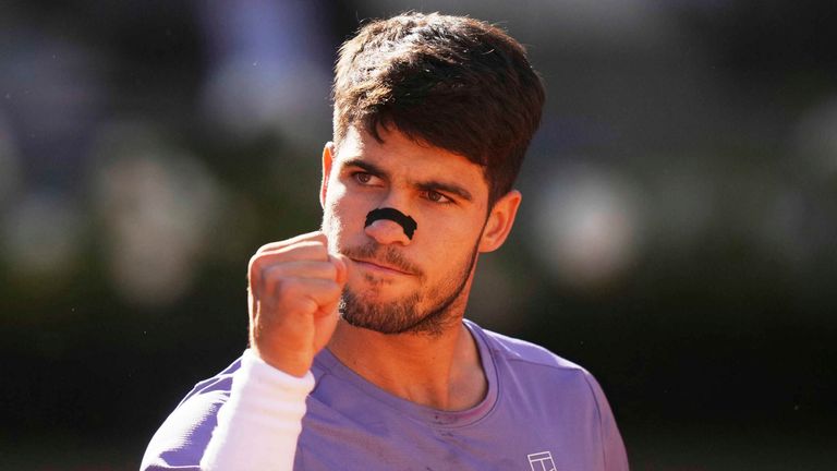 Spain's Carlos Alcaraz celebrates after winning point during the semifinal tennis match against taly's Lorenzo Musetti at the Italian Open, in Rome, Friday, May 16, 2025. (AP Photo/Andrew Medichini)