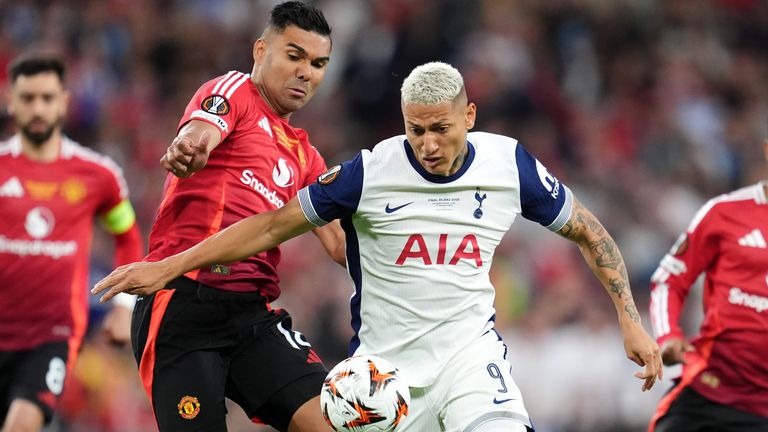 Casemiro and Richarlison battle for the ball in the opening stages of the Europa League final