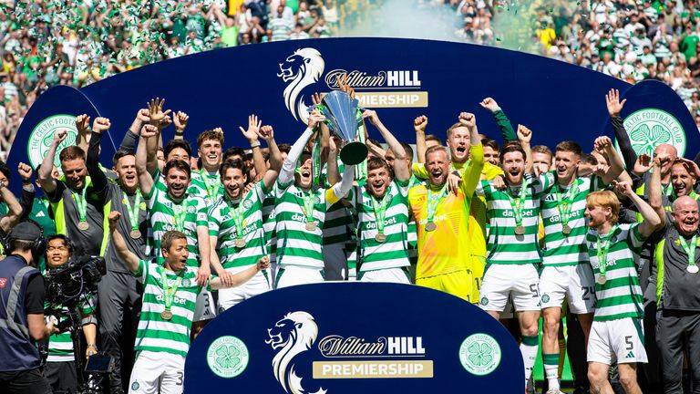 Celtic's Callum McGregor and James Forrest lift the trophy