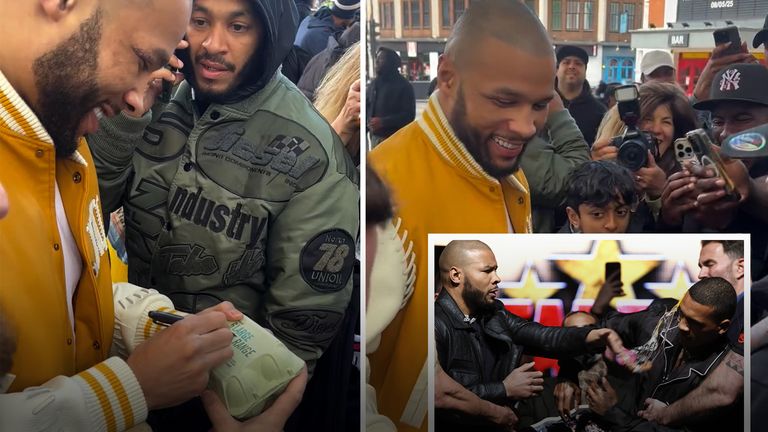 Chris Eubank Jr was by fans as he walked through London and stopped to take some photos and even signed some egg cartons in reference to his press conference stun when he smashed an egg onto Conor Benn. 