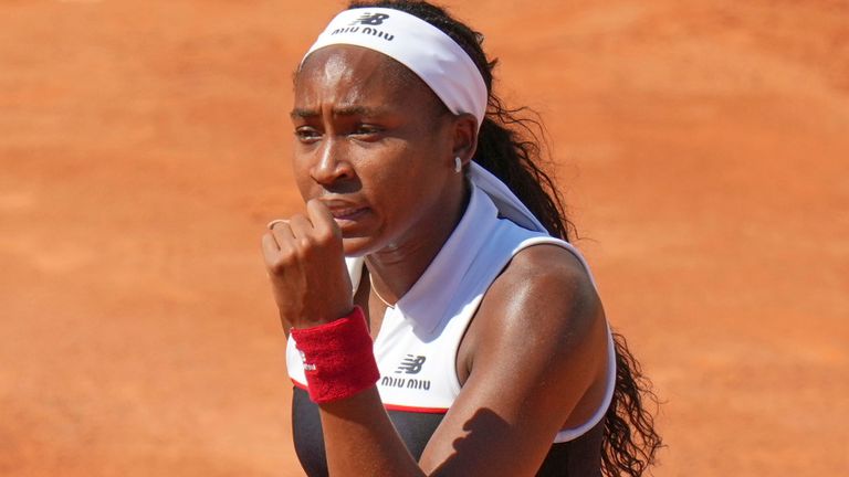 United States' Coco Gauff reacts as she plays Britain's Emma Raducanu during their tennis match at the Italian Open at the Foro Italico, in Rome, Monday, May 12, 2025 (AP Photo/Alessandra Tarantino)