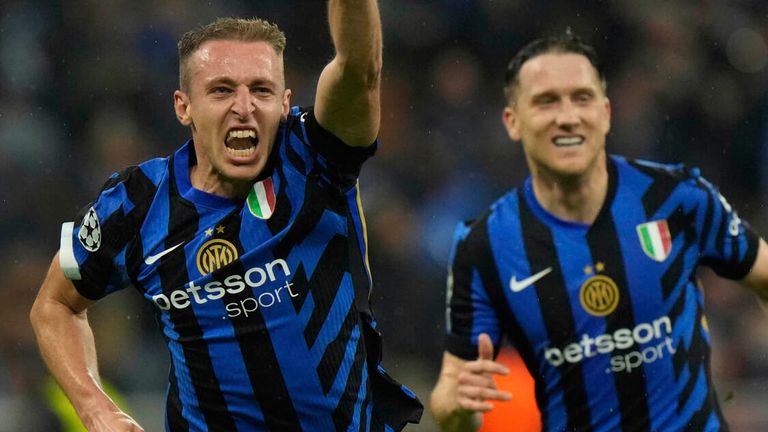 Inter Milan's Davide Frattesi, left, celebrates after scoring his side's fourth goal during the Champions League semifinal second leg soccer match between Inter Milan and Barcelona at San Siro stadium in Milan , Italy, Tuesday, May 6, 2025. (AP Photo/Luca Bruno)