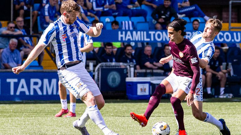 KILMARNOCK, SCOTLAND - MAY 18: Hearts' Yan Dhanda (R) fouls Kilmarnock's Stuart Findlay before being sent off following a VAR check during a William Hill Premiership match between Kilmarnock and Heart of Midlothian at Rugby Park, on May 18, 2025, in Kilmarnock, Scotland. (Photo by Alan Harvey / SNS Group)
