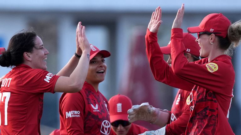 England's Em Arlott celebrates after dismissing West Indies' Zaida James with Sophia Dunkley during the Second Women's International T20 match at The 1st Central County Ground, Brighton and Hove. Picture date: Friday May 23, 2025.