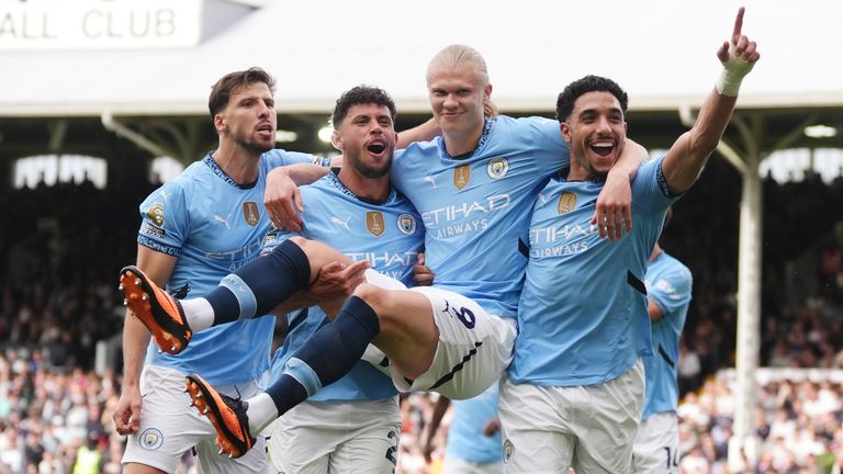 Manchester City's Erling Haaland celebrates scoring their side's second goal of the game with team-mates